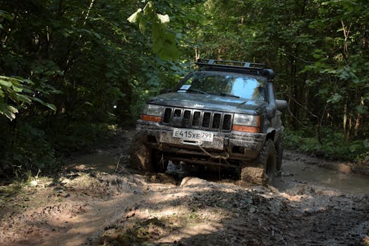 Jeep on a rocky trail with off-road tires