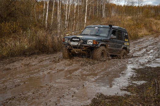 Jeep navigating challenging terrain