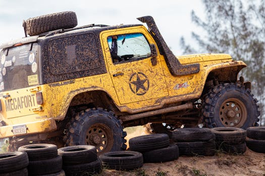 Jeep navigating a rugged trail